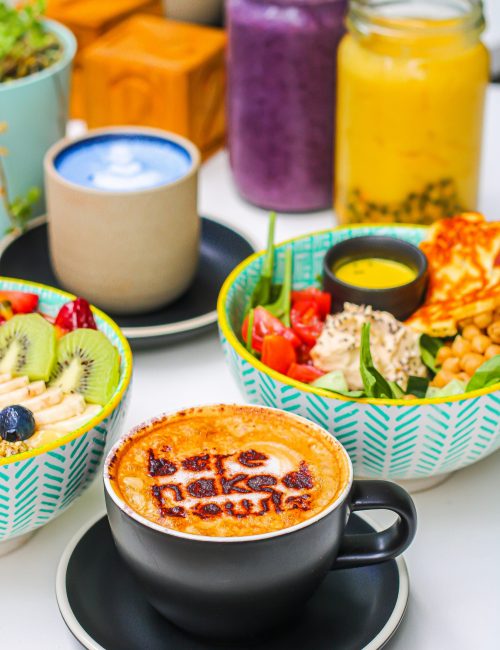 Displaying acai bowls, coffee and smoothies available at Bare Naked Bowls Newstead